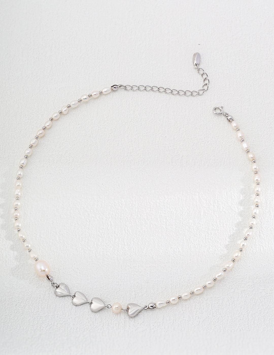 Mademoiselle - Heart necklace made of natural pearls